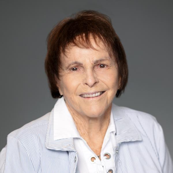 woman with light blue jacket