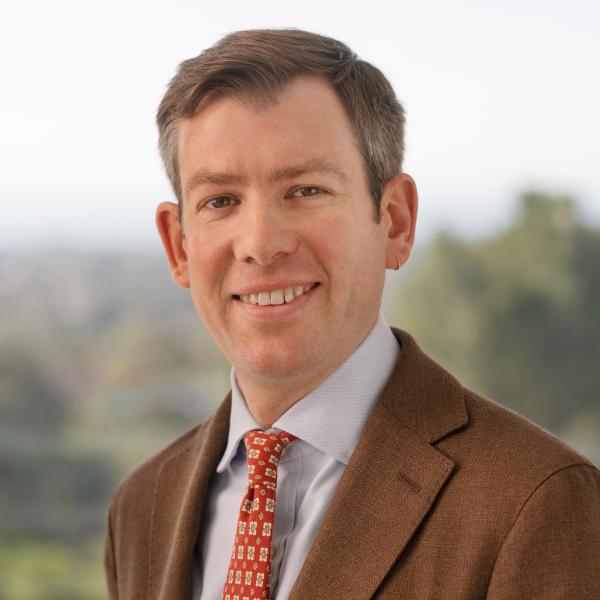 man with brown jacket